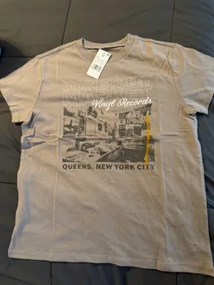 Doe Records gray cotton t-shirt with black/white graphic of a street scene with the text 'MAIN STREET MARKET', 'Ving Records', and 'QUEENS, NEW YORK CITY' #newyork #records thumbnail 1