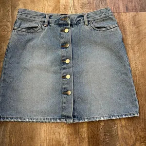 Moda International short Jean skirt, button down, women size 8 light denim thumbnail 1