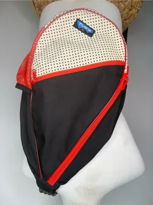 Kavu Backpack Black and Cream Polka Dot Sling Bag with Red Accents thumbnail 1