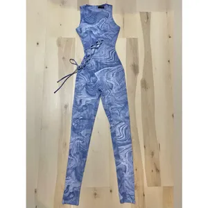 Naked Wardrobe NWT Women Small Blue Marble Mesh No Strings Attached Jumpsuit thumbnail 5