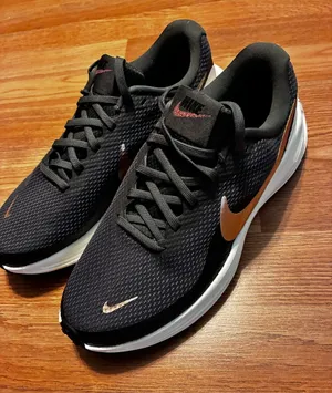 Nike Women Black and Copper Running Shoes thumbnail 1