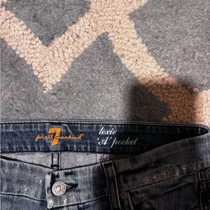 7 For All Mankind Distressed Flare Jeans in Dark Blue thumbnail 2
