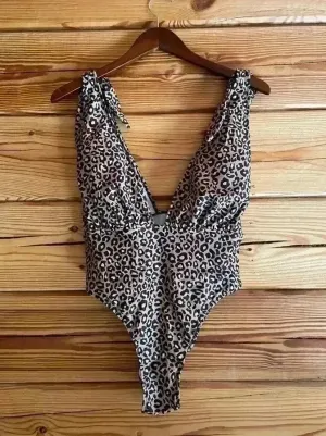 NWOT cheetah one piece​​​​ Size L thumbnail 1
