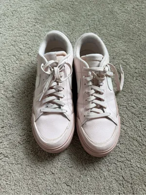 Nike Women’s Light Pink Low-Top Sneakers with White Swoosh thumbnail 2
