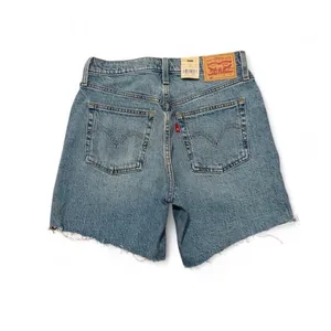 Levi’s 501 women’s mid thigh blue raw hem jean shorts thumbnail 2