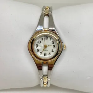 Women’s silver gold tone watch quartz 22mm mop dial links bracelet 6.5” running thumbnail 1