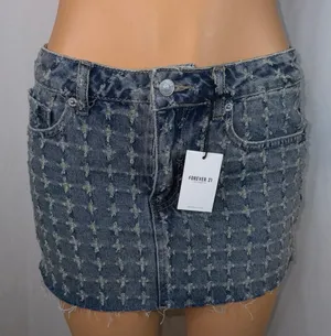 Forever 21 Distressed denim mini skirt thumbnail 2