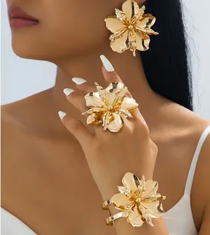 3-Piece Gold Flower Jewelry Set | Statement Earrings, Ring & Cuff Bracelet thumbnail 1