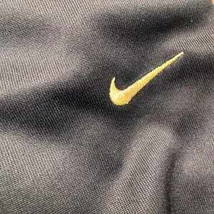 Nike Sportswear Women Black Gold Logo Tape‎ Track Pants Joggers AR4912-010 L thumbnail 3