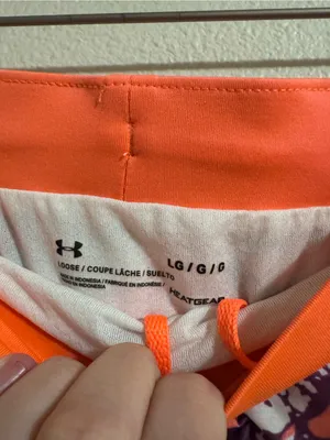 Under Armour Neon Coral & Purple Abstract Athletic Shorts thumbnail 2