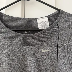 Nike Women's Charcoal Grey Long Sleeve Seamless Running Shirt thumbnail 2