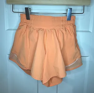 Lululemon Orange Hotty Hot 4” - Size 0 thumbnail 1