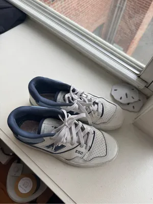 New Balance 550 Women’s White and Navy Leather Sneakers thumbnail 3