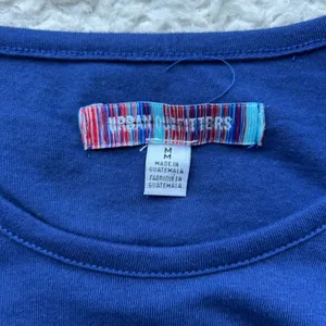 Urban Outfitters Blue Graphic Crop Top Size Medium thumbnail 11