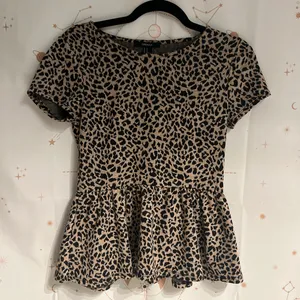Forever 21 Leopard Print Peplum Top thumbnail 1