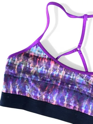 Alo Yoga racerback Spark sports bra featuring a purple abstract print thumbnail 7