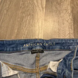 American Eagle Next Level Stretch Hi-Rise Ripped Jeggings thumbnail 5