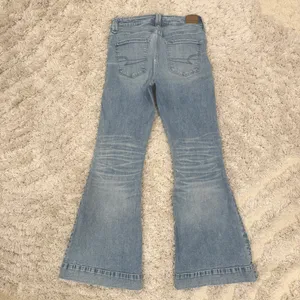 American Eagle High Rise Flare | 70s Inspired Denim thumbnail 8