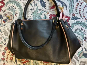 Sleek Black Pebbled Tote with Pink Trim and Gold Hardware thumbnail 1