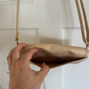 Beis The Travel Wallet Bag in beige vegan‎ leather. thumbnail 12