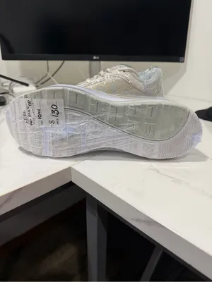 Nike Beige Athletic Sneakers with Gold Swoosh thumbnail 2