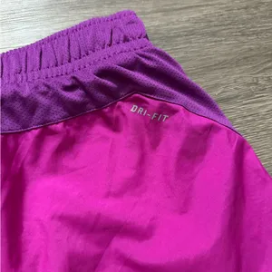 Nike Women's Magenta and Purple Athletic Shorts Size M thumbnail 6
