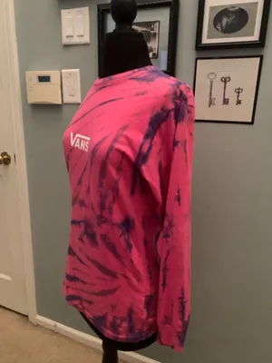 This is a pink and purple Vans tie-dye long-sleeve t-shirt featuring the brand's signature white logo on the chest. thumbnail 4