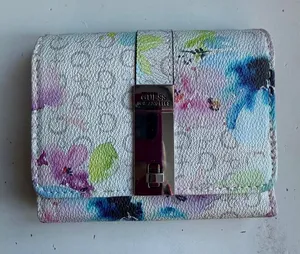NWOT’s Guess Floral Print Wallet with Metal Clasp thumbnail 1