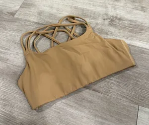 Athleta Solace Keyhole Sports Bra in Tan Size S thumbnail 1