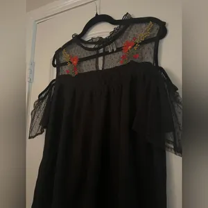 Black off the shoulder top with sheer mesh sleeves and embroidered flowers thumbnail 2