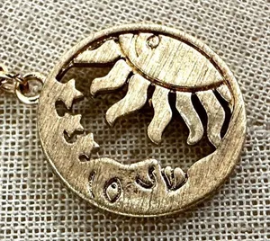 Gold tone Sun and Moon Disc Necklace thumbnail 1