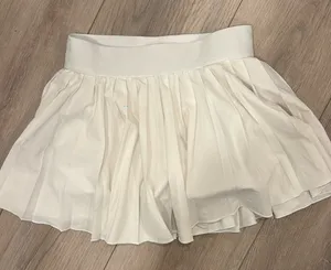 aritzia Golden Women's Movetech Tennis Pro Micro Skirt thumbnail 1
