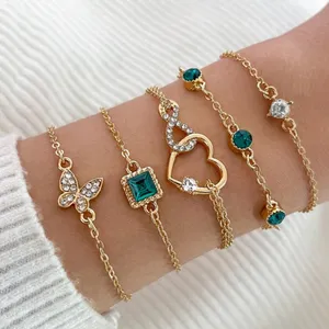 Set of 5 Elegant Gold and Emerald Bracelets - Butterfly and Heart (NEW) thumbnail 1