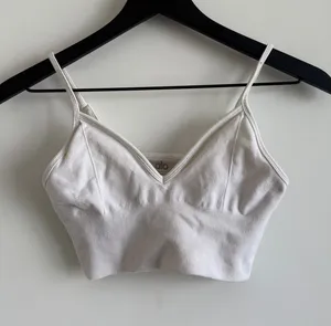 ALO Yoga Cream Ribbed Sports Bra thumbnail 1