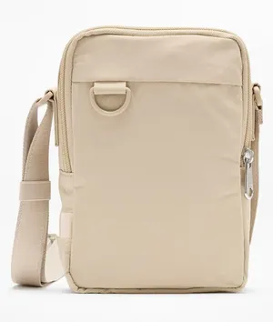 New Athleta Anytime Vertical Crossbody Travel Bag Zephyr Tan thumbnail 1