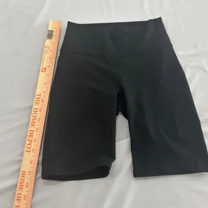Fabletics PowerHold Black High Waisted Biker Shorts with Pockets Womens thumbnail 3