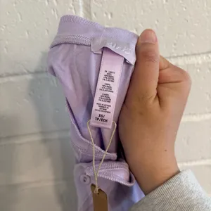 NWT SKIMS boyfriend longsleeve Henley shirt in lily thumbnail 6