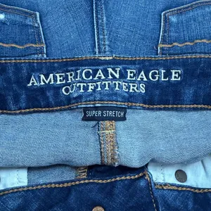 American Eagle Outfitters Ripped Blue Jean Shortie Shorts thumbnail 3