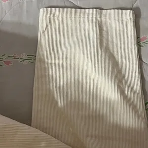 Cream high-waisted corduroy straight leg pants. thumbnail 5