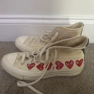 Creme Off White Converse Chuck Taylor All Star high top sneakers with red heart-shaped eyes #converse #hearts thumbnail 2