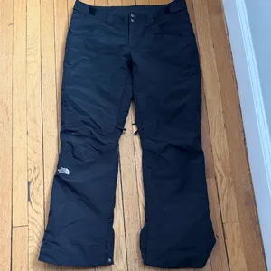 The Northface woman’s black snow pants size L EUC thumbnail 2