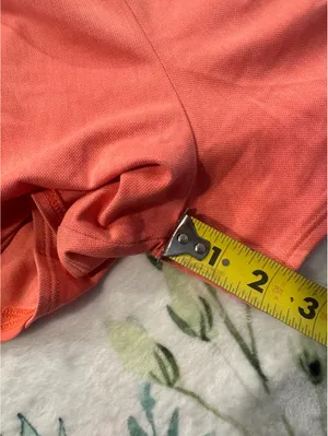 Under Armour Running Shorts Athletic Gym Workout in a coral orange tone Size L thumbnail 8