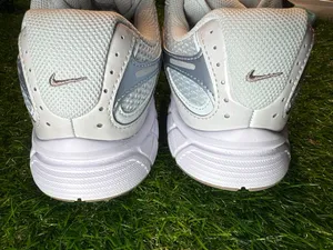 Nike running sneakers. 6 youth, women’s 7.5. Neutral colors. So pretty. thumbnail 4