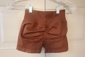Workout booty shorts bundle of XS's exercise shorts in yellow and brown. thumbnail 4