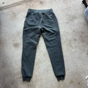 FIGS Zamora Jogger Scrub Pants in the limited-edition bonsai green colorway, featuring a comfortable yoga waistband and contrasting reddish drawstring thumbnail 6