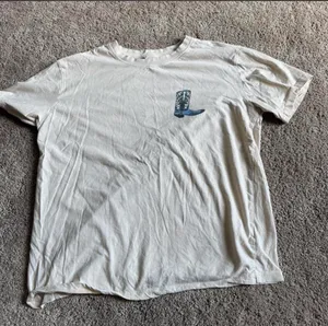 Urban Outfitters boot shirt thumbnail 1