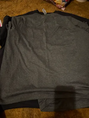 Gray t-shirt featuring a ghost print in teal and pink of the Hitchhiking Ghosts of the Haunted Mansion. Great for Disney parks and Halloween parties. thumbnail 3