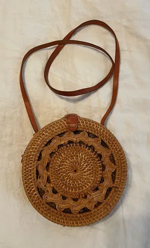 Free People Round Woven Crossbody in Brown thumbnail 1