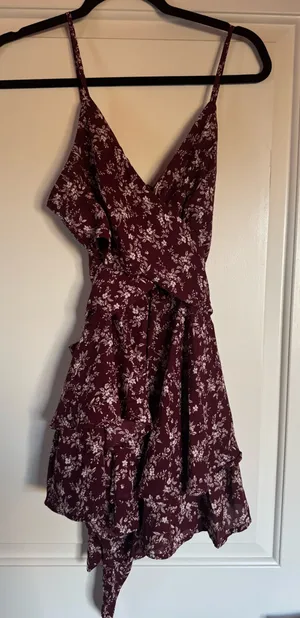 Francesca’s burgundy floral romper thumbnail 1