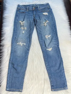 American Eagle Faded Distressed Low Rise Jeggings thumbnail 1